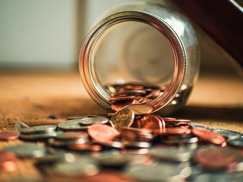 A jar of coins on its side